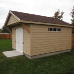 Cedar brackets and transom window